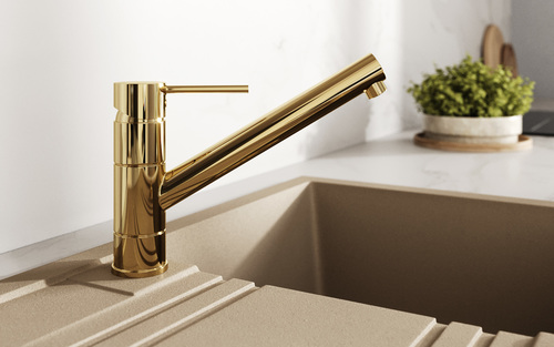 Złote dodatki i baterie zlewozmywakowe dodadzą kuchni blasku, szyku i powiewu luksusu